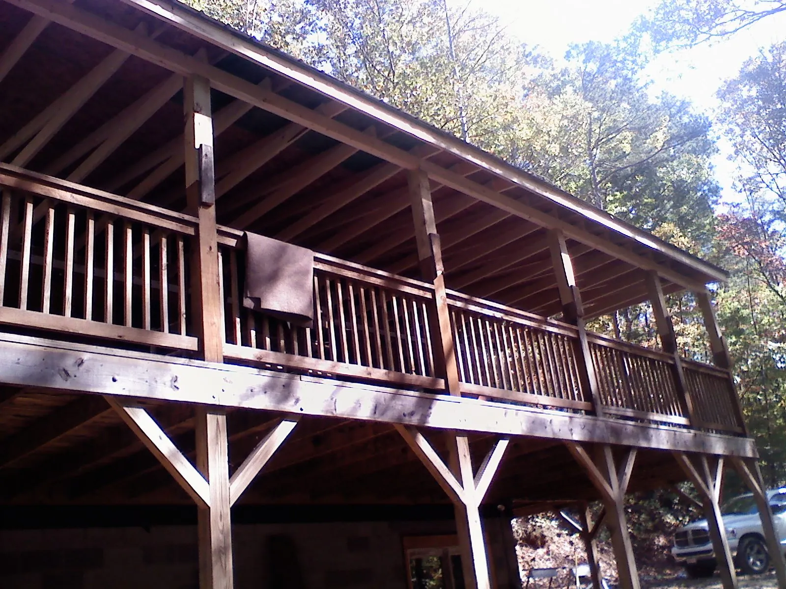 Timber framing under a new elevated porch and deck — Roof Leak Repair in Pensacola by Roofing Brothers